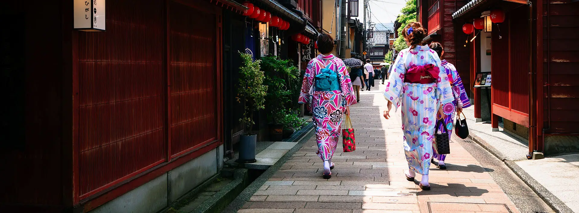 Geishas walking in a town